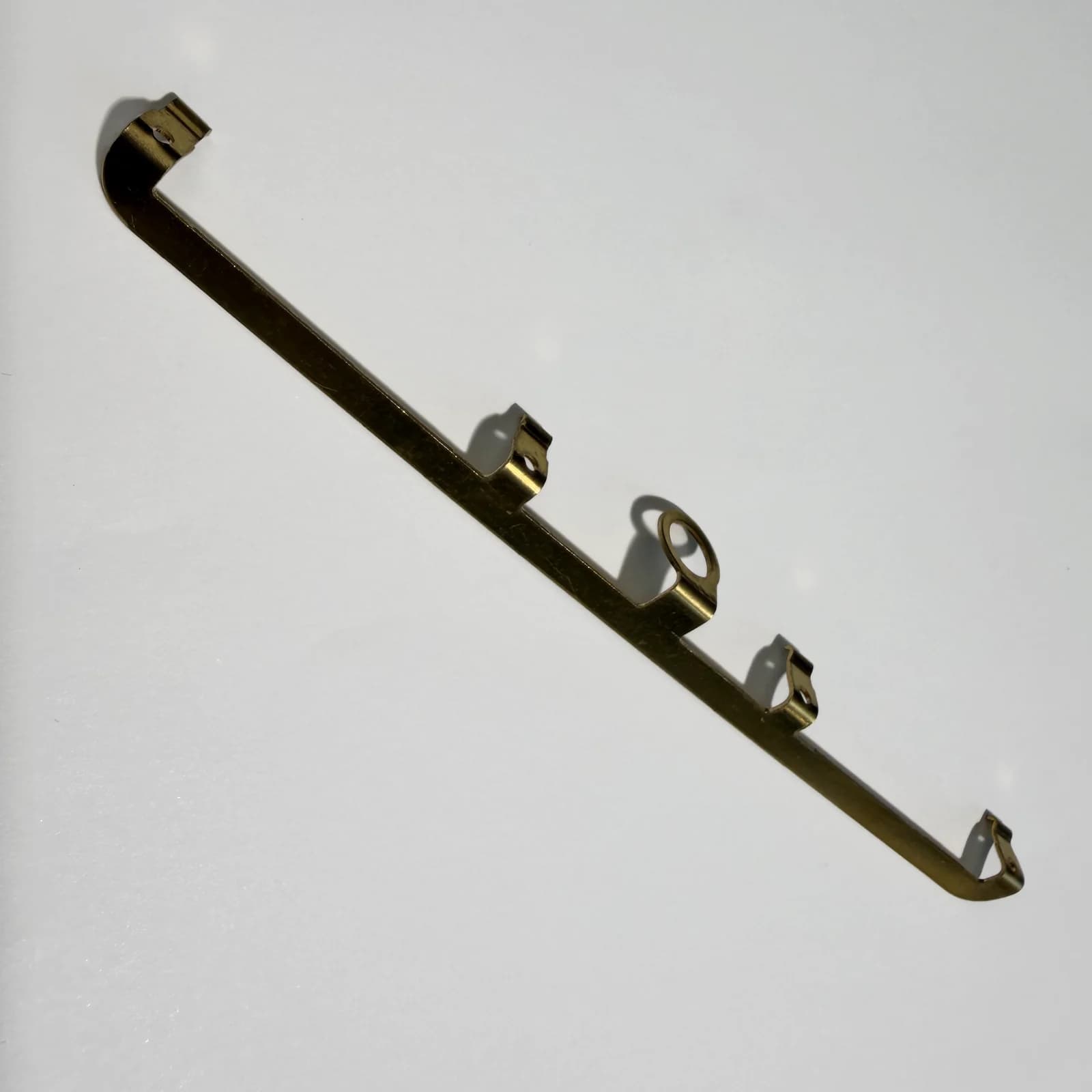 A multi-position conductive strip with repeated formed features.