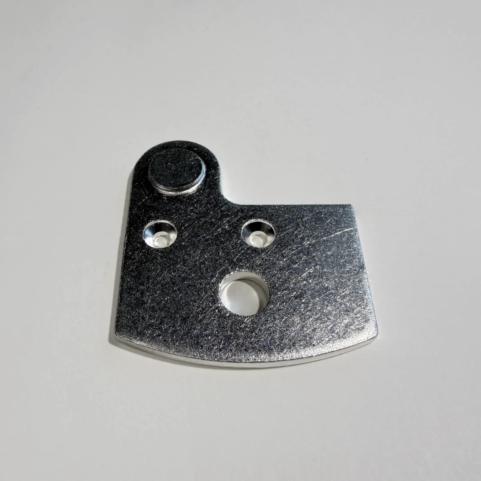 Custom welded electrical contact assemblies shown on a light neutral background.