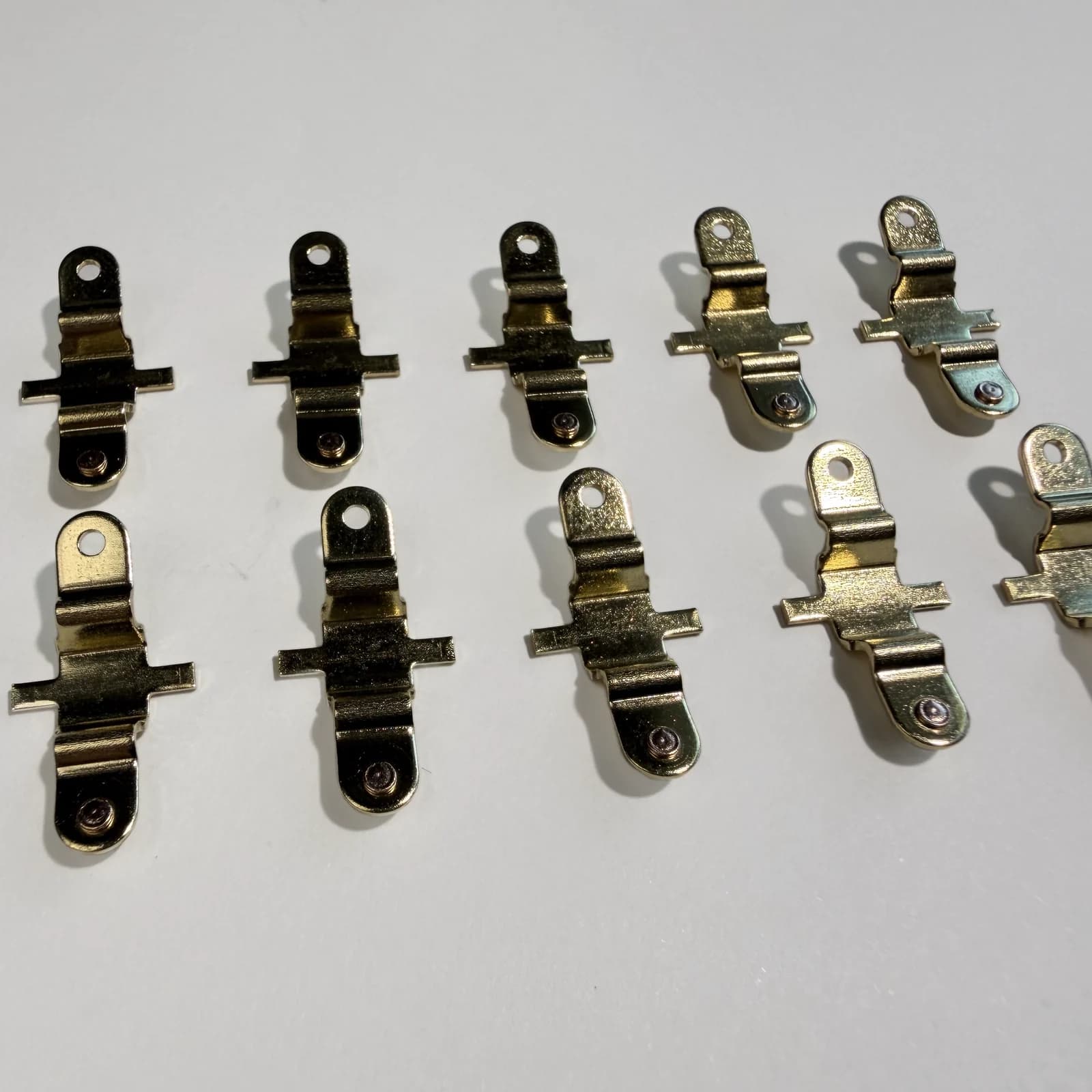 Product photograph: Reverse side. Locate the end formed during riveting.